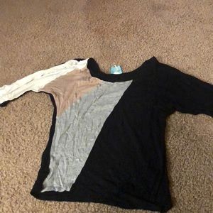 White,tan,grey,and black top